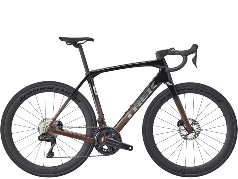 TREK Domane SL 7 Gen 4 2026 Dark Star'Bronze Age Fade cestovni bicikl